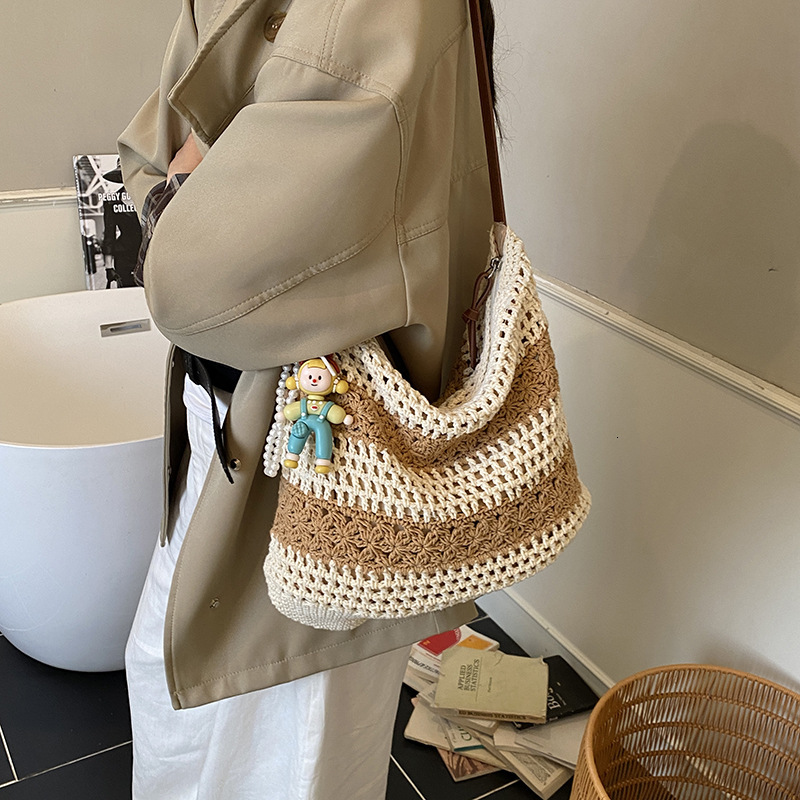 Korean style women's simple grass woven large capacity crochet commuting shoulder bag, high-end vacation handbag shoulder bag, designer bag