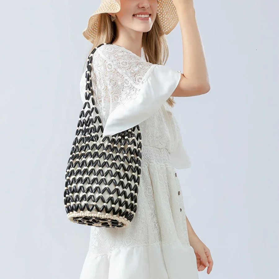 Women Woven Hand Bag Summer n Hollow-out Wooden Bead Tote Bucket Shoulder Bag Female Reticulate Netted Canvas Beach Handbag 260303