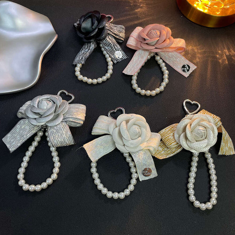Sweet camellia pearl phone strap, bag and car key pendant, airpods earphone case accessory