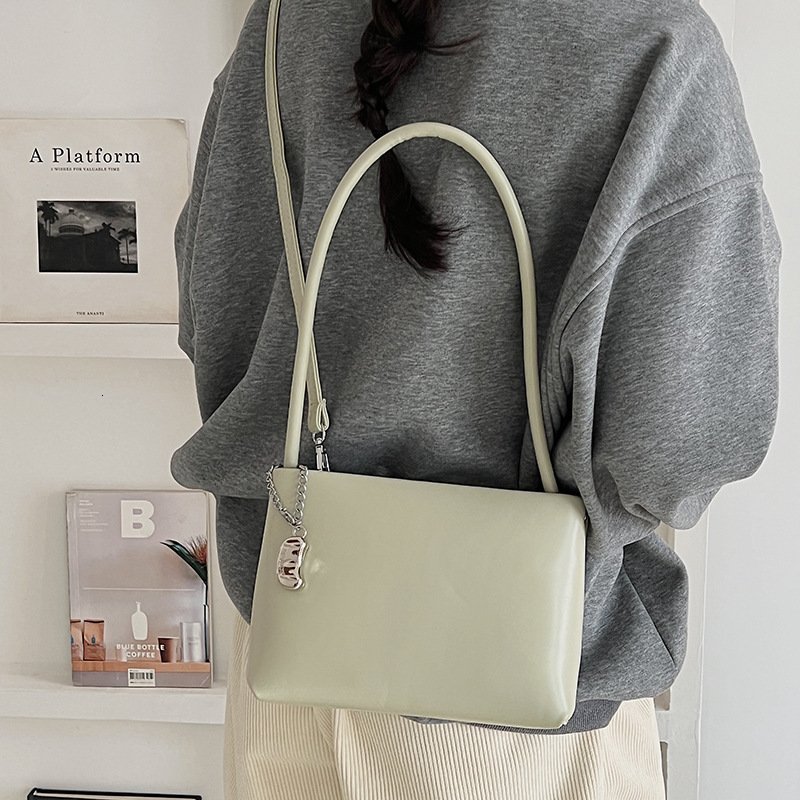 Elegant retro single shoulder armpit bag, new pillow bag, simple commuting women's bag, niche fashion crossbody bag, single shoulder bag, designe