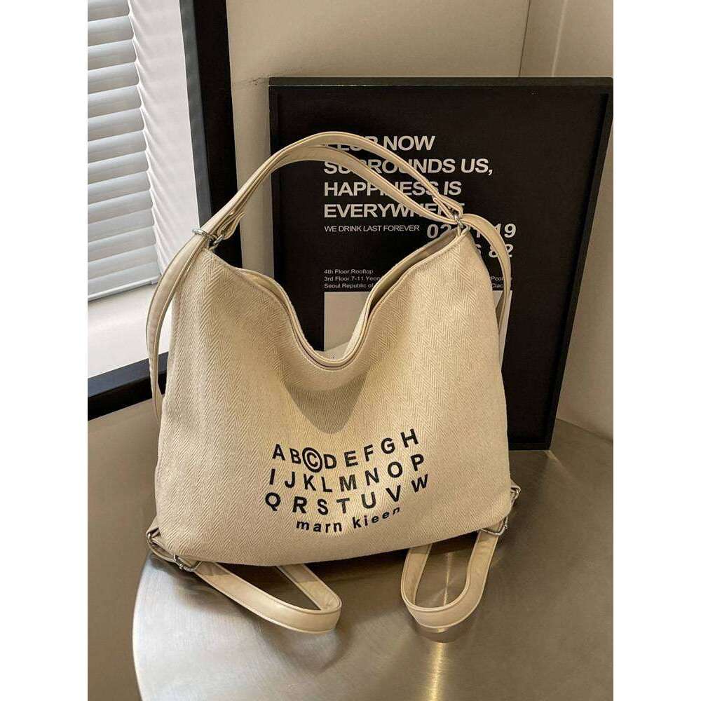 Korean Style Casual Letter Printed Large Capacity Canvas Bag New Unique Tote With Minimalist That Can Also Be Used As A Backpack XIU LAI SI