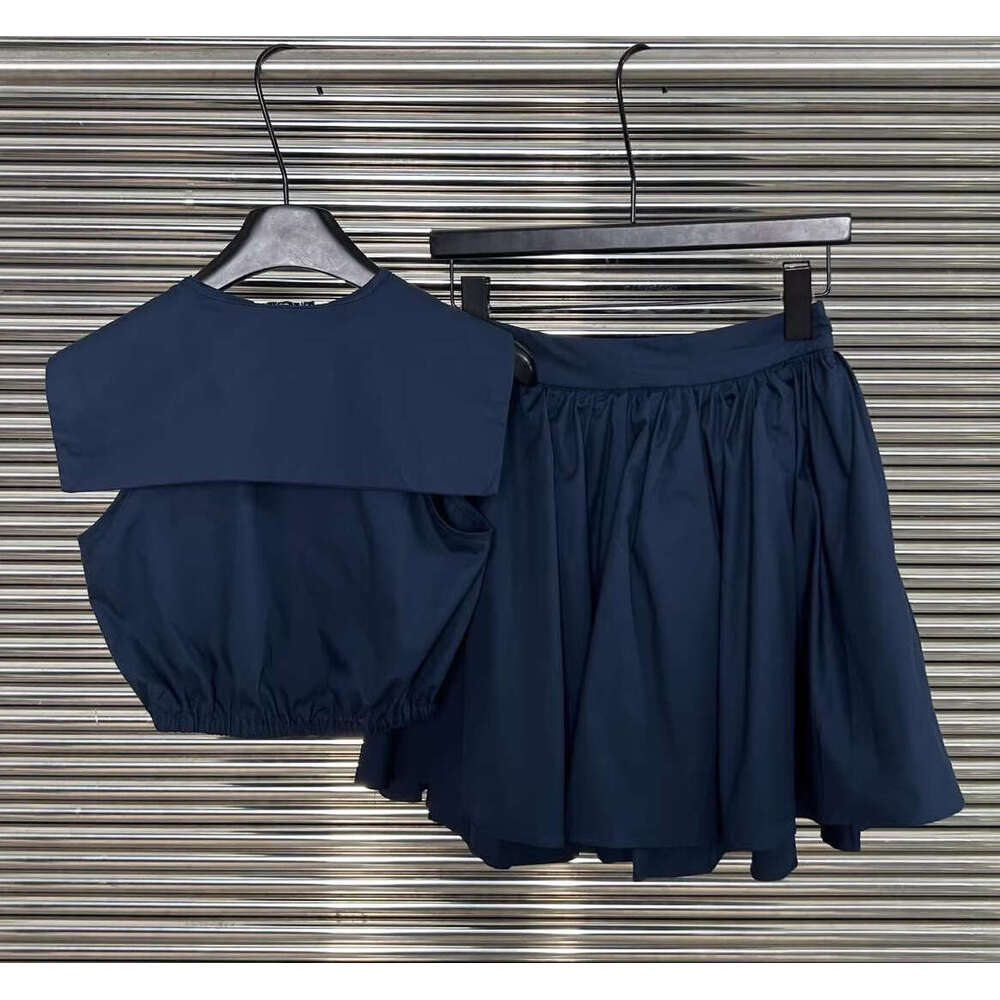 2026 new retro style A4 slim fit bright navy blue sleeveless dress paired with a back waist tie and sexy short skirt