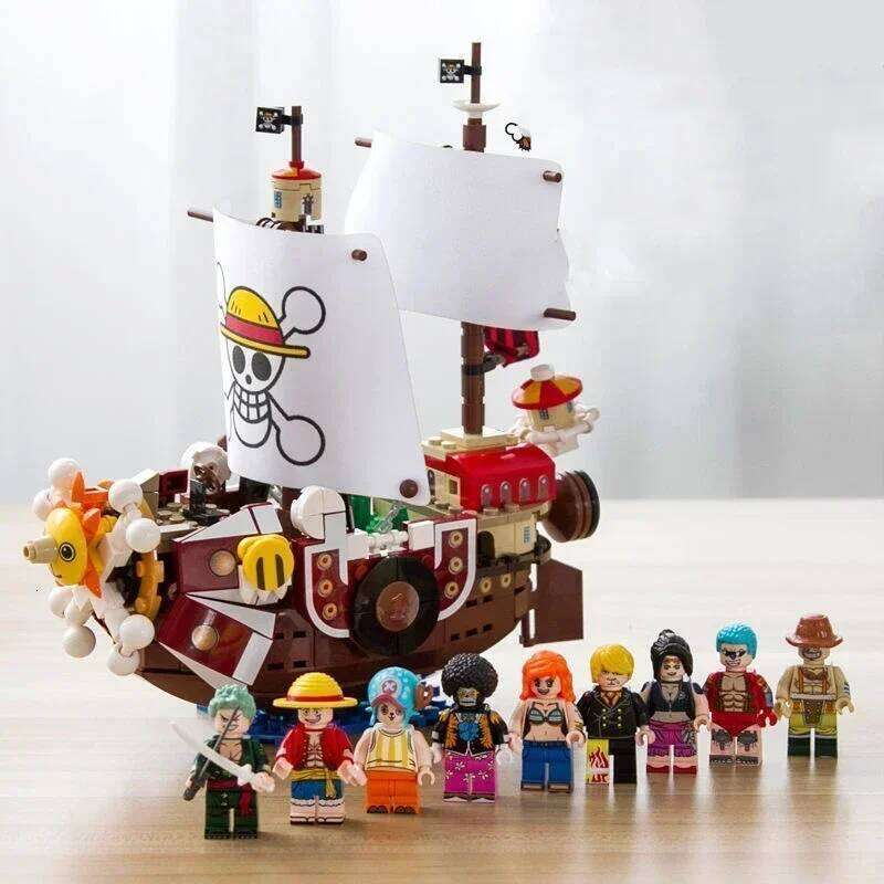 1484pcs/432Pcs+9Dolls Thousand Sunny Boat Blocks Cartoon Pirate Ship Bricks Set Toys for Children Christmas Gifts Z260305