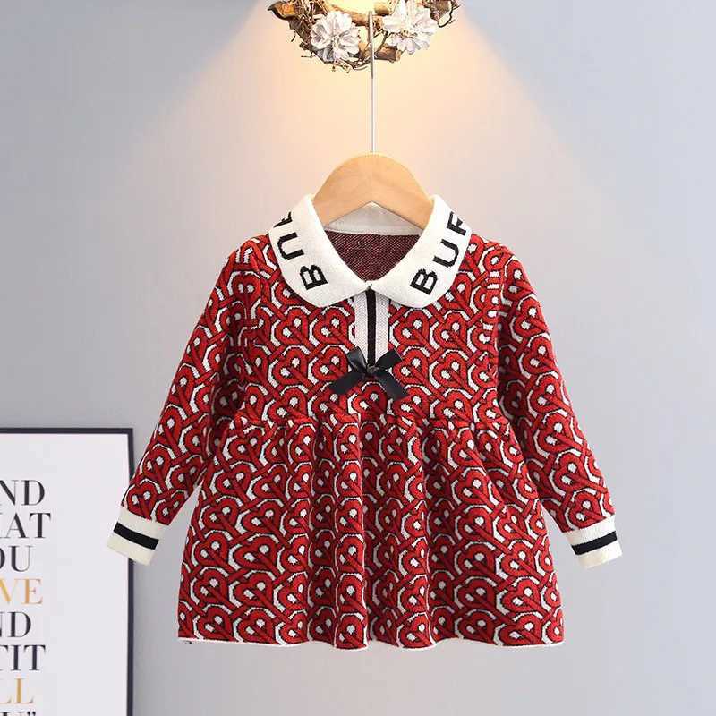 This girls' heart letter knitted dress is Korean-style, luxurious, and sweet, making it a perfect long-sleeve princess dress with a bow for autum