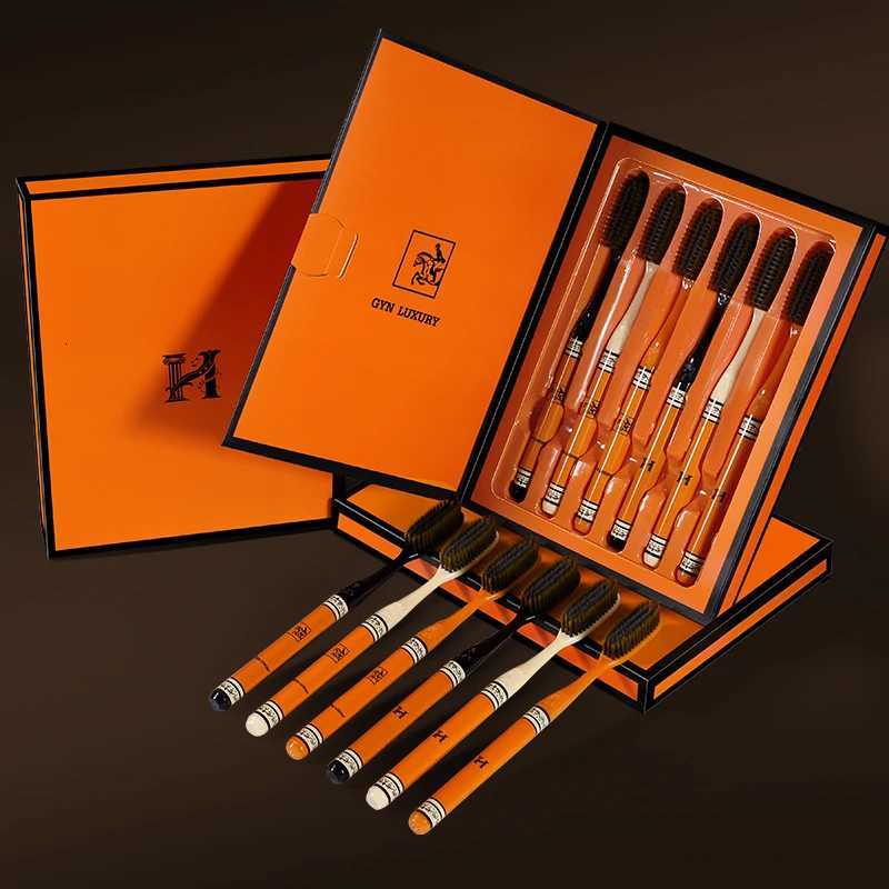 This pack of 6 high-end light luxury adult toothbrushes features long heads and soft bristles, making them ideal for daily household oral care.T260306