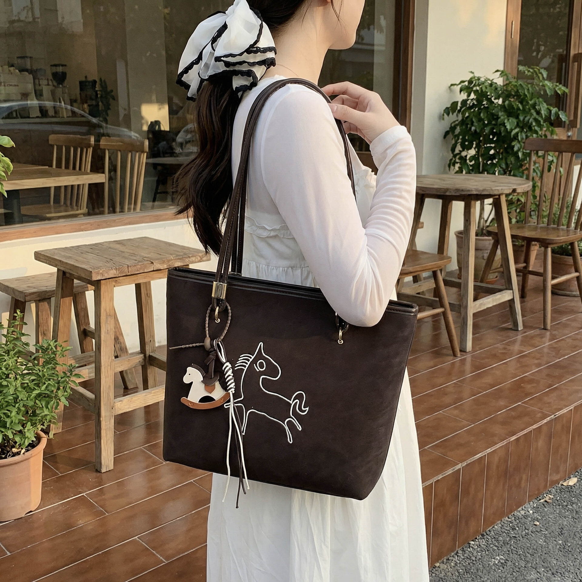 Suede Pony Multi functional Women's Handbag New Fashion Handbag Retro Bucket shaped Work and Commuter Bag Designer Bag