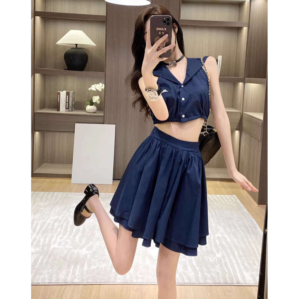2026 new retro style slim fit bright navy blue sleeveless dress paired with a back A1 waist tie and sexy short skirt