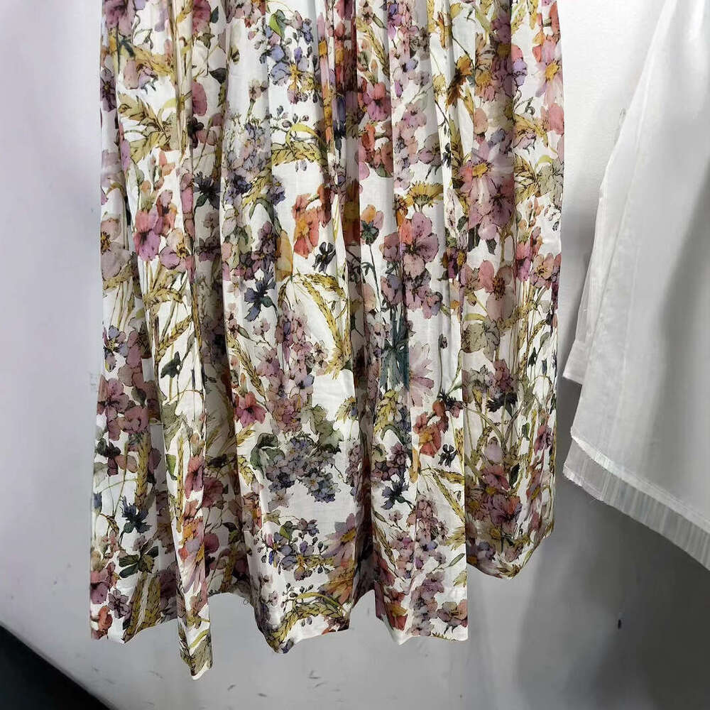The 2026 Spring and Summer A4 New Collection features a colorful floral cotton chiffon pleated skirt for women