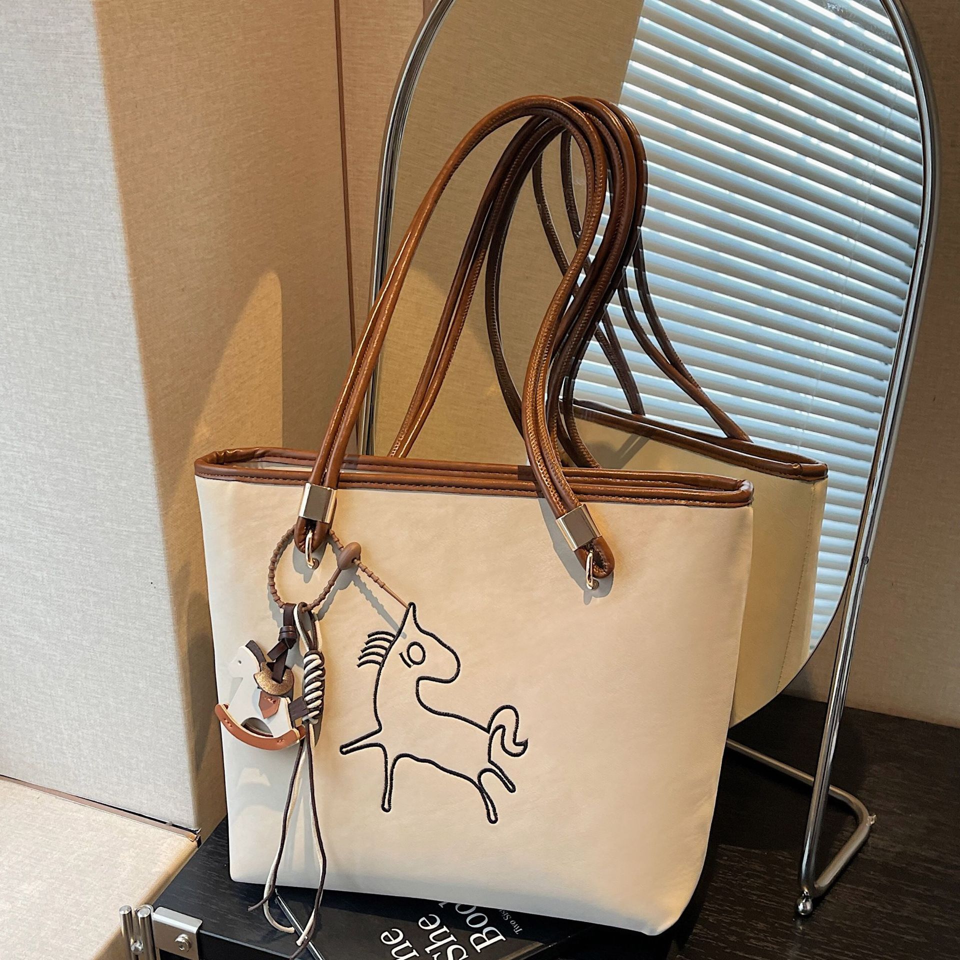 Suede Pony Multi functional Women's Handbag New Fashion Handbag Retro Bucket shaped Work and Commuter Bag Designer Bag