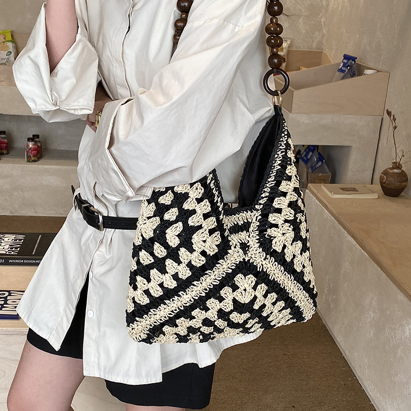 Beach vacation straw bag women's new multifunctional commuting shoulder bag art niche handbag crossbody bag designer bag