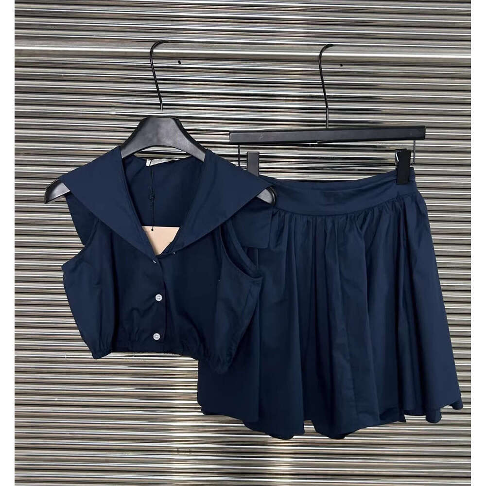 2026 new retro style slim a3 fit bright navy blue sleeveless dress paired with a back waist tie and sexy short skirt