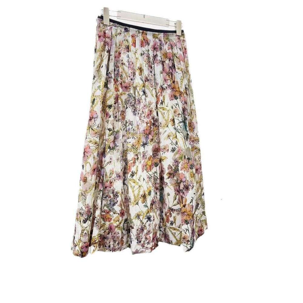 The 2026 Spring and Summer A4 New Collection features a colorful floral cotton chiffon pleated skirt for women