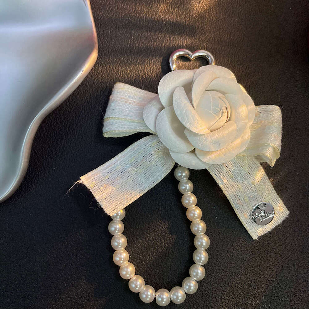 Sweet camellia pearl phone strap, bag and car key pendant, airpods earphone case accessory