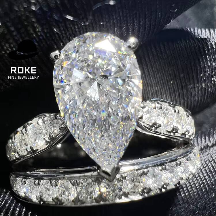 Elegant Stackable Diamond Rings for Women9K-18K White Gold Lab-grown Pear-shaped Center Diamond Accented by Round-cut Diamonds