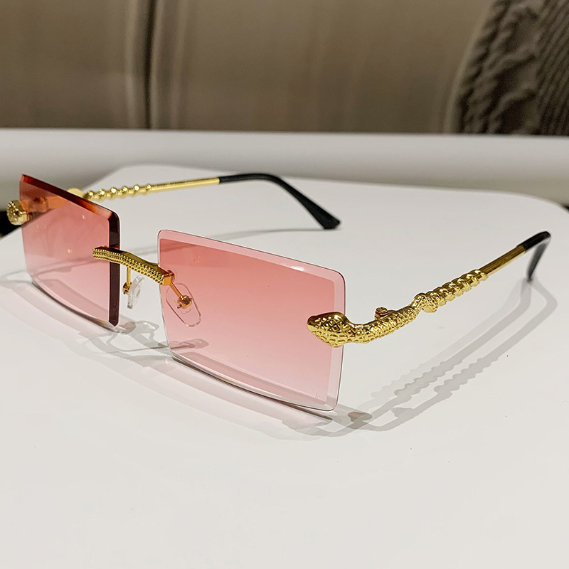 2026 New Designer Luxury Brand Fashion Personality INS Serpentine Frameless Sunglasses Outdoor Driving Fashion Street Style Value Sunglasses
