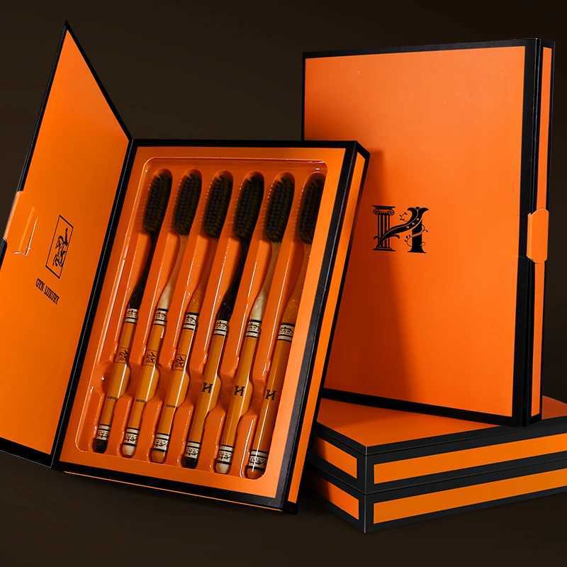 This pack of 6 high-end light luxury adult toothbrushes features long heads and soft bristles, making them ideal for daily household oral care.T260306