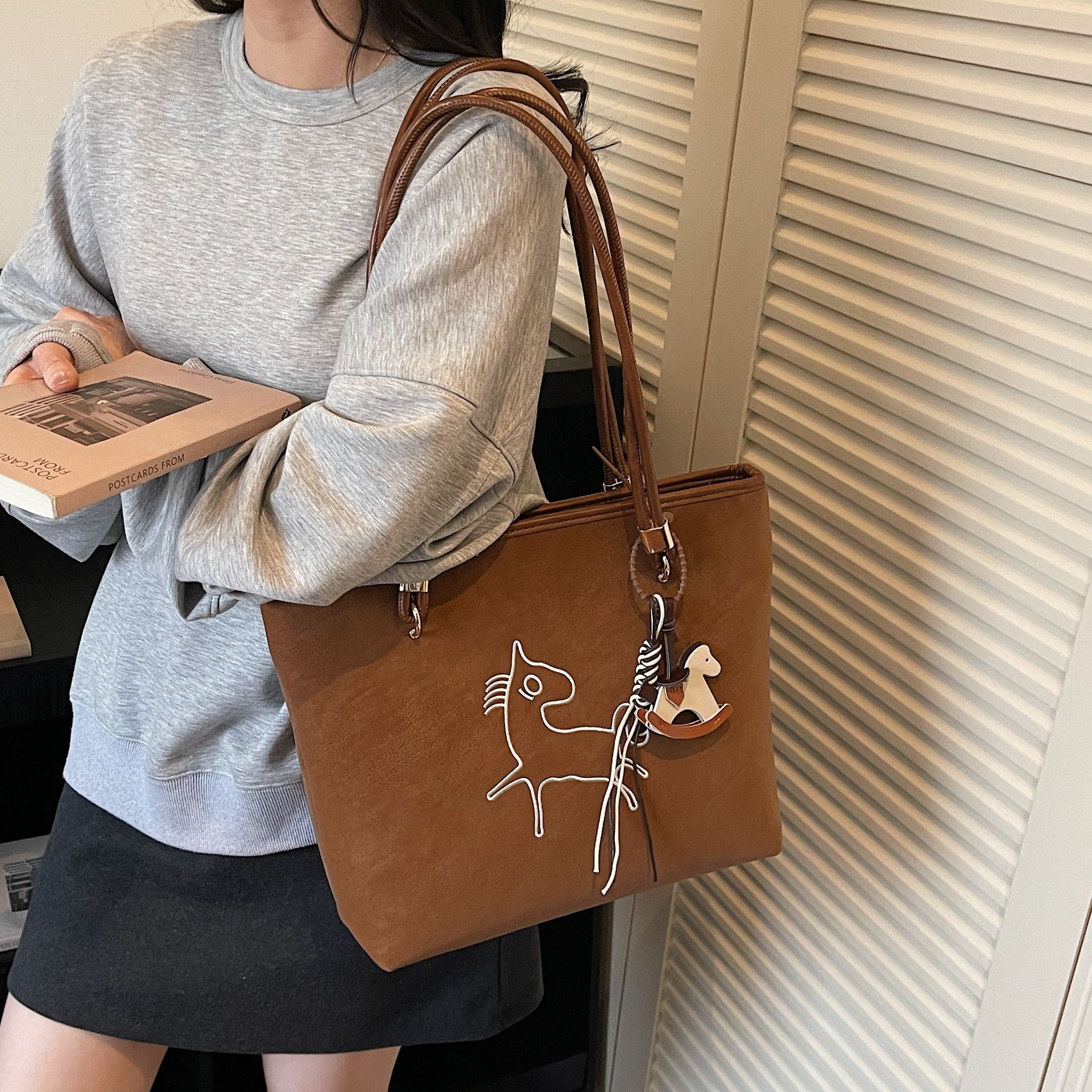 Suede Pony Multi functional Women's Handbag New Fashion Handbag Retro Bucket shaped Work and Commuter Bag Designer Bag