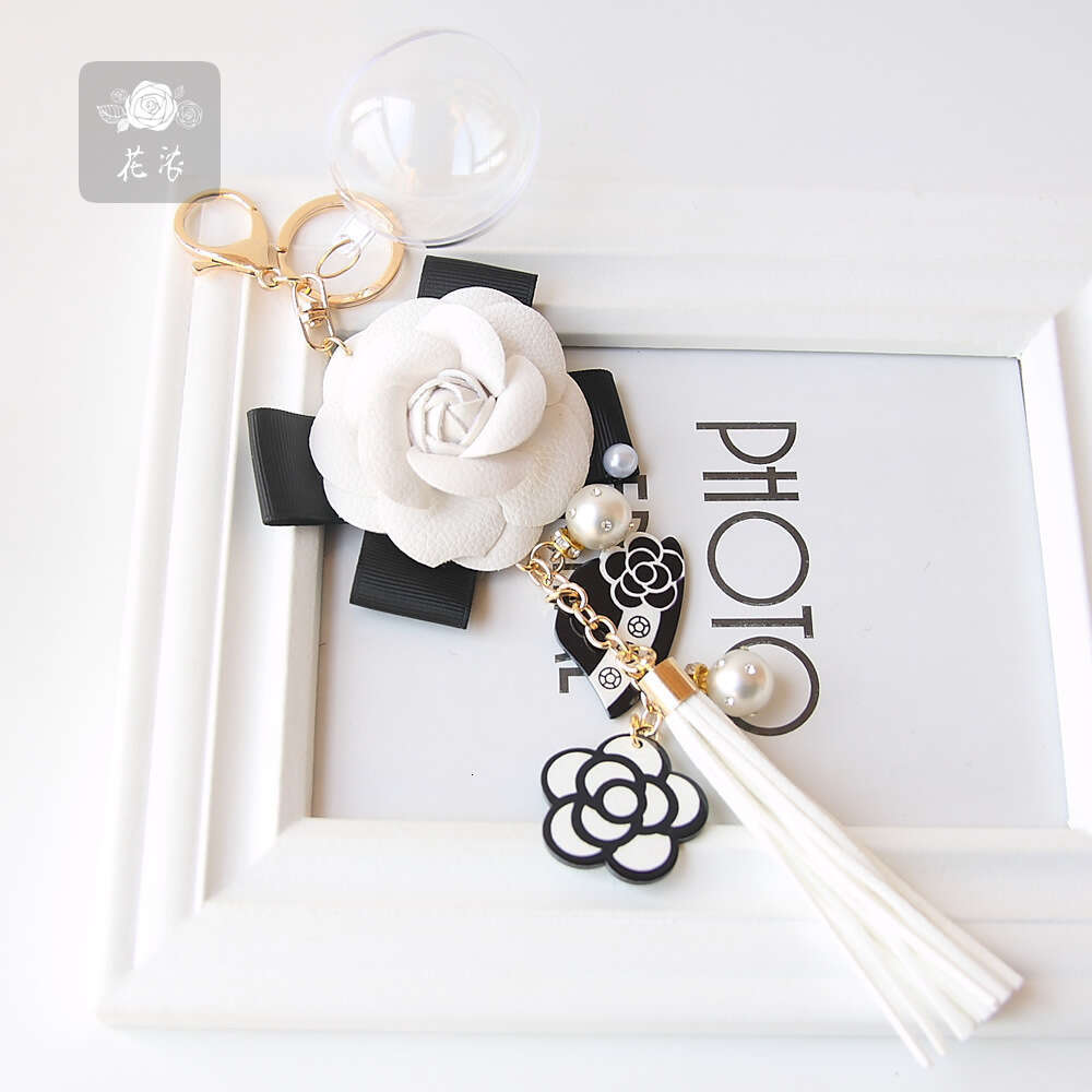 Hepburn-style camellia tassel pearl eternal flower keychain, bag charm, exquisite handmade floral gift