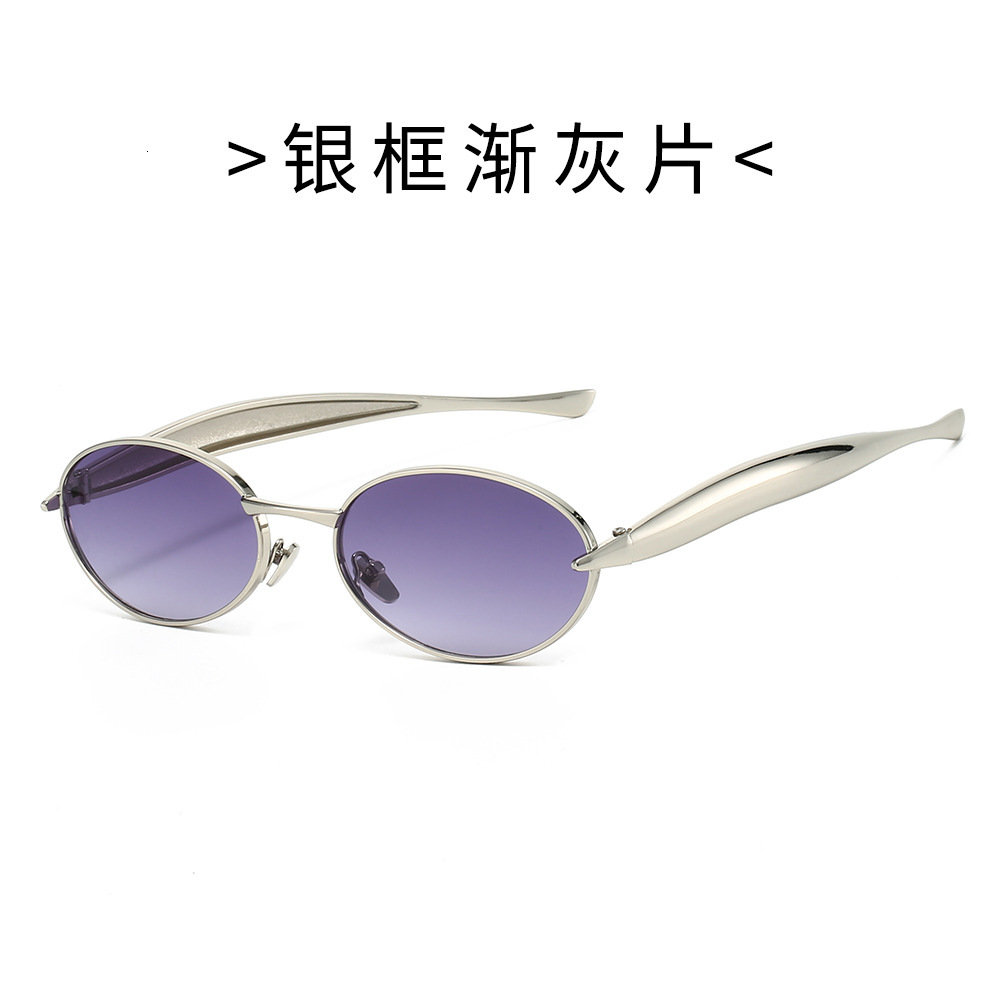 New European American oval small-frame sunglasses for men women, featuring high-end, fashionable, and unique design with a metallic trendy look