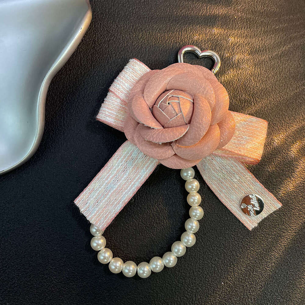 Sweet camellia pearl phone strap, bag and car key pendant, airpods earphone case accessory