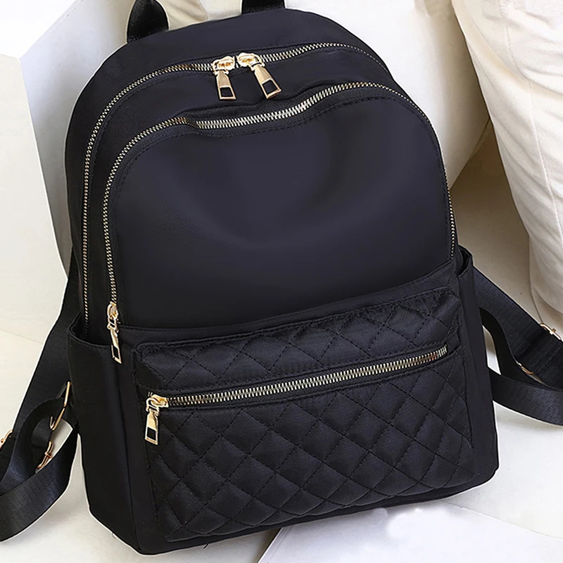 Mens and Womens Trendy Travel Oxford Cloth Small Backpacks Womens Versatile Canvas Bags School Bags260228