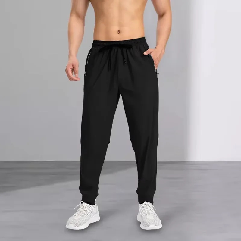 Ice silk pants mens quick drying elastic trend casual pants ultra-thin ice sports pants 260306