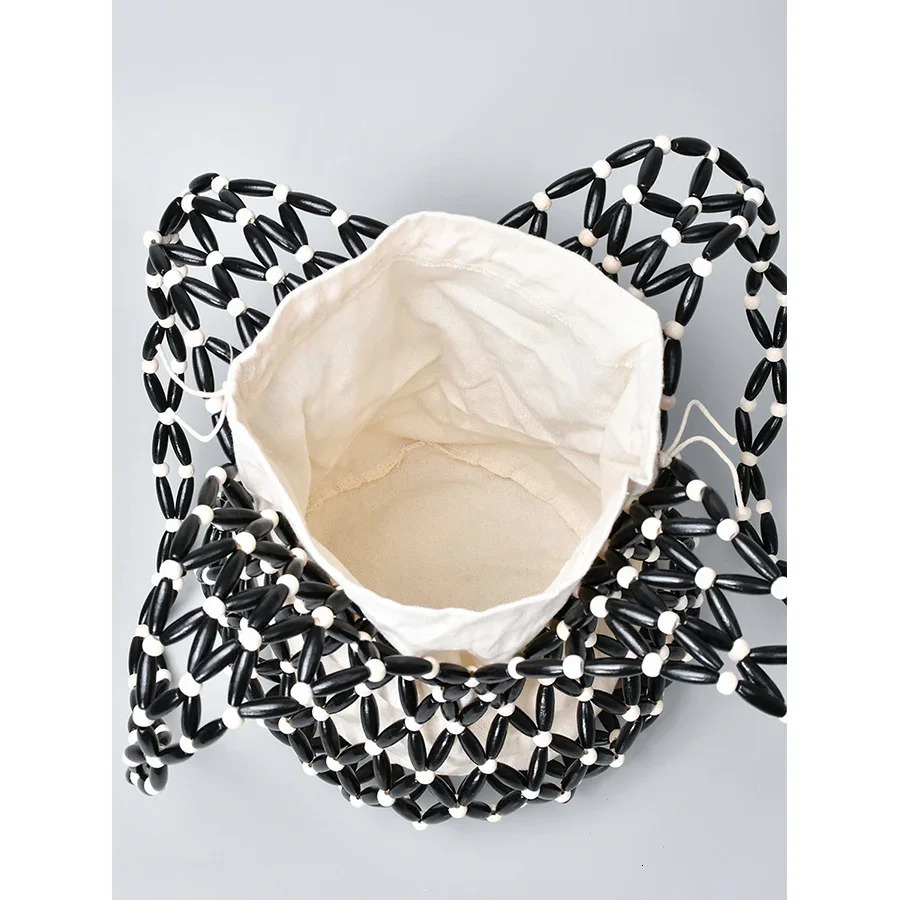 Women Woven Hand Bag Summer n Hollow-out Wooden Bead Tote Bucket Shoulder Bag Female Reticulate Netted Canvas Beach Handbag 260303