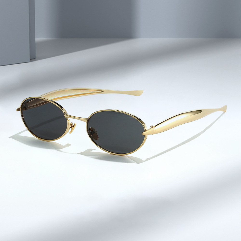 New European American oval small-frame sunglasses for men women, featuring high-end, fashionable, and unique design with a metallic trendy look