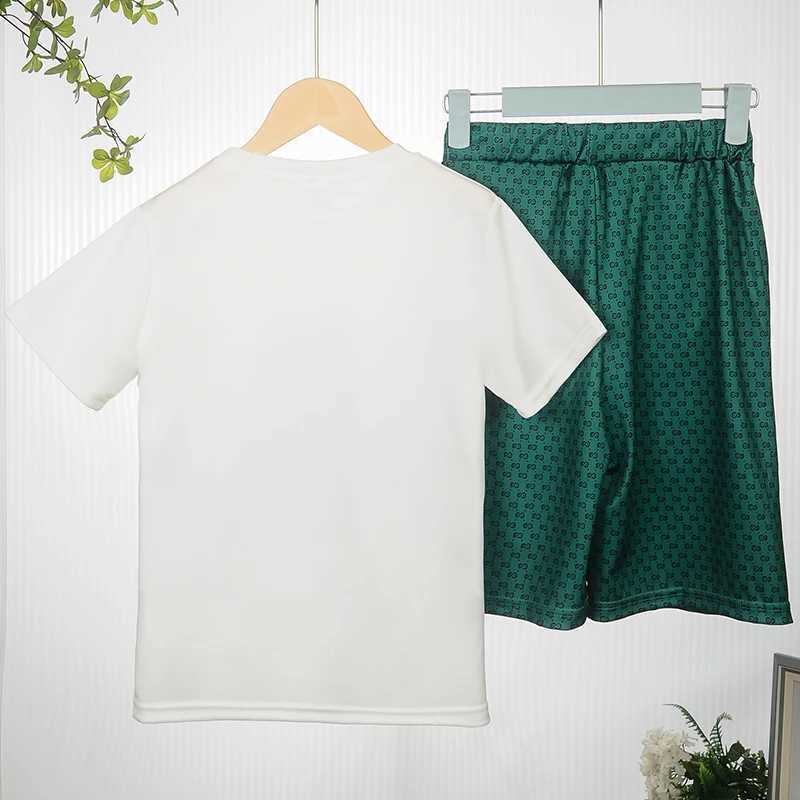 This kids' green bear letter short-sleeve set is breathable, comfortable, and trendy, making it a versatile casual two-piece set for both boys an