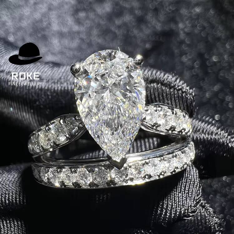 Elegant Stackable Diamond Rings for Women9K-18K White Gold Lab-grown Pear-shaped Center Diamond Accented by Round-cut Diamonds