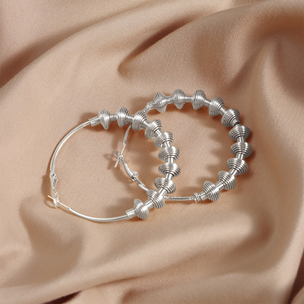 Modern Minimalist Hooped Studs Featuring Unique Geometry & Eye-Catching Metals