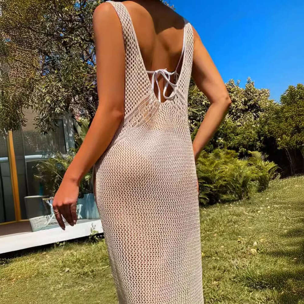 Foreign trade cross-border European American 2026 source manufacturer V-neck sleeveless solid color hollow-out dress for beach vacation spring and sum