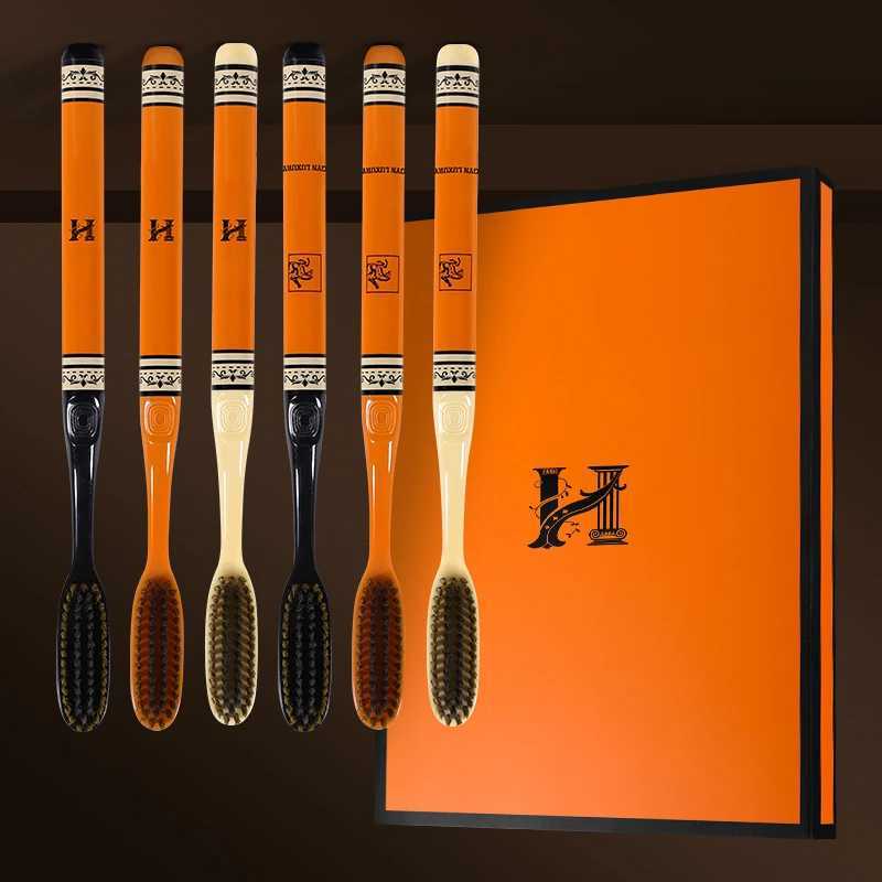 This pack of 6 high-end, light luxury adult toothbrushes features long heads and soft bristles, making it ideal for household use.T260306