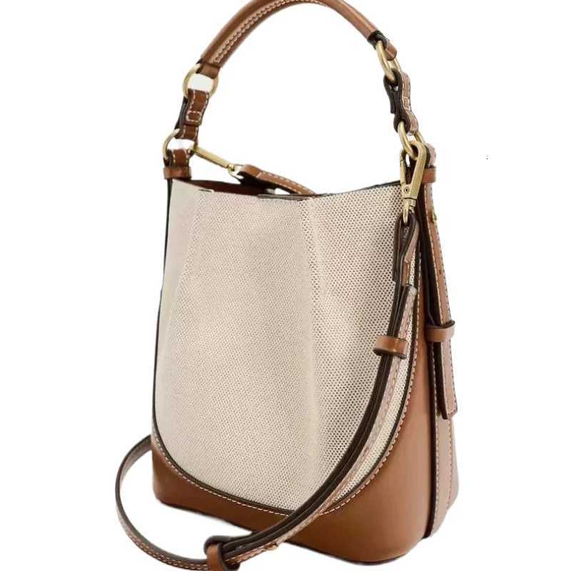 2026 Womens Large Capacity Bucket Bag with Wide Shoulder Strap Single Shoulder Handbag Drawstring Handheld Crossbody Bag H260306