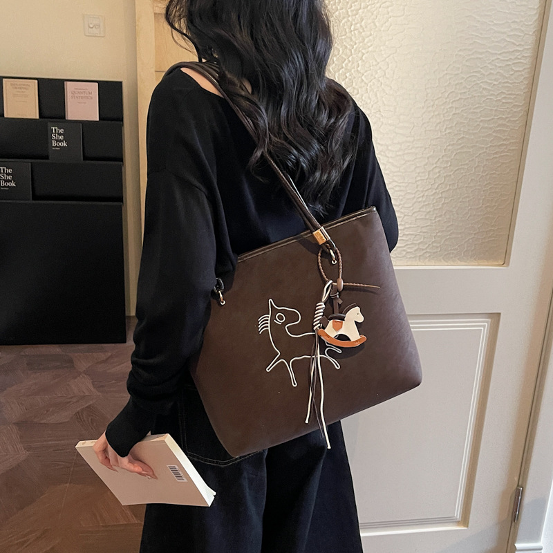 Suede Pony Multi functional Women's Handbag New Fashion Handbag Retro Bucket shaped Work and Commuter Bag Designer Bag