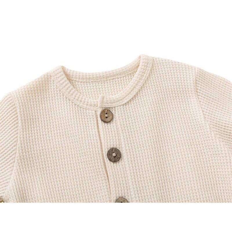 Spring Autumn Newborn Baby Romper Cotton Solid Soft Infant Jumpsuit With Pocket Girl Boy Long Sleeve Bebe Pajamas Wodden Buttons Z260306