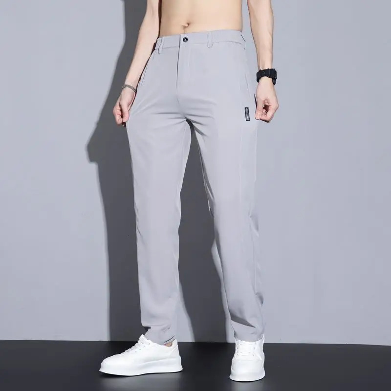 Ice silk mens pants summer black gray thin business casual pants outdoor elastic breathable straight leg sports pants 260306