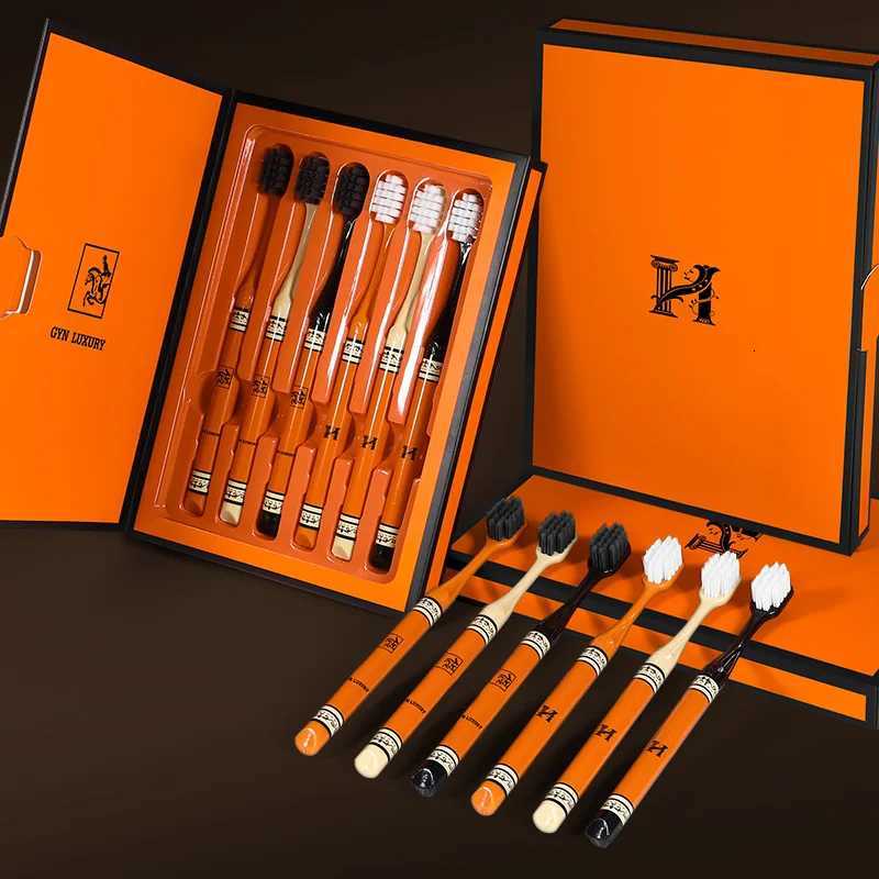 This pack of 6 high-end orange small-head toothbrushes for adults is designed for efficient and comfortable household use.T260306