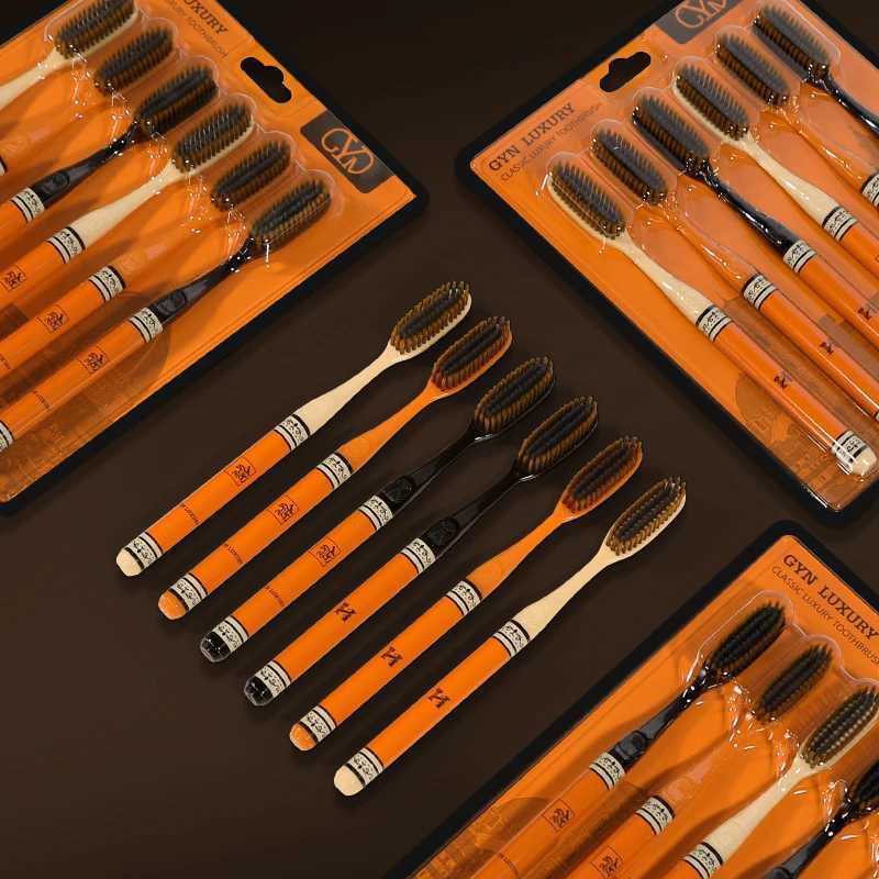 This 12-pack of high-end adult toothbrushes with extended heads and soft bristles is designed as a convenient household set.T260306