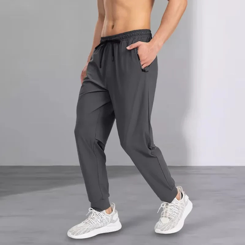 Ice silk pants mens quick drying elastic trend casual pants ultra-thin ice sports pants 260306