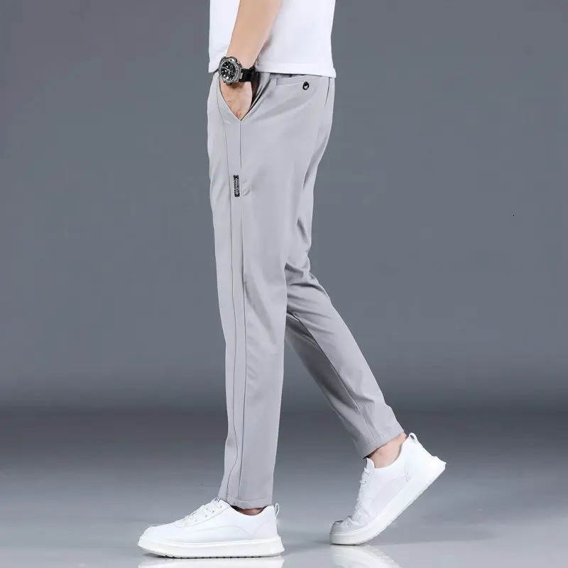 Ice silk mens pants summer black gray thin business casual pants outdoor elastic breathable straight leg sports pants 260306
