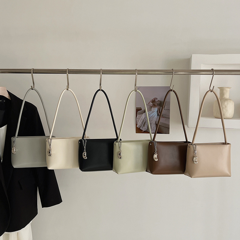 Elegant retro single shoulder armpit bag, new pillow bag, simple commuting women's bag, niche fashion crossbody bag, single shoulder bag, designe