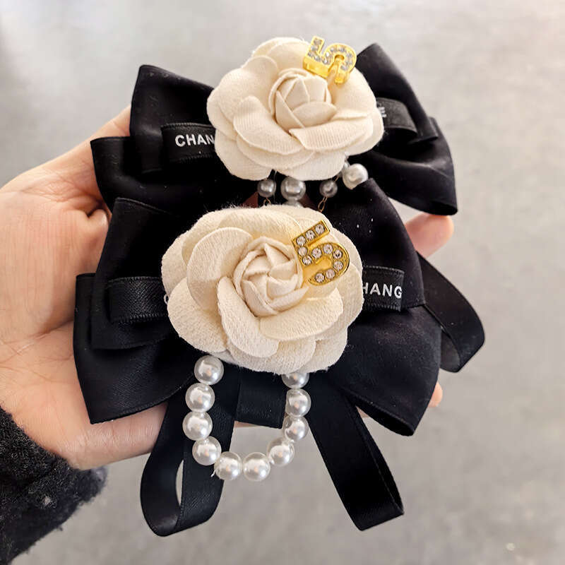 2025 New Camellia Bowknot Fashion Versatile Bow Tie Flower Pearl Brooch