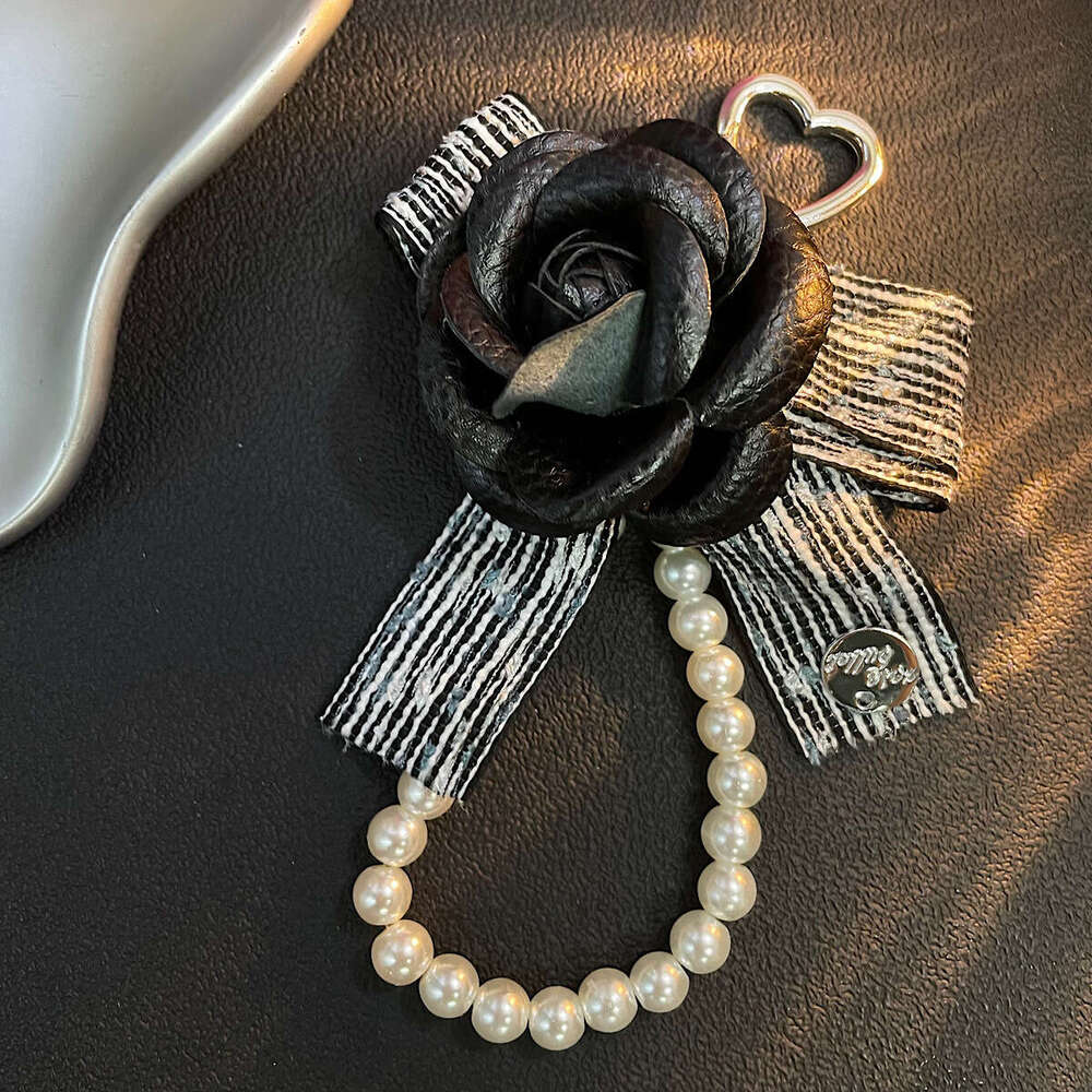 Sweet camellia pearl phone strap, bag and car key pendant, airpods earphone case accessory