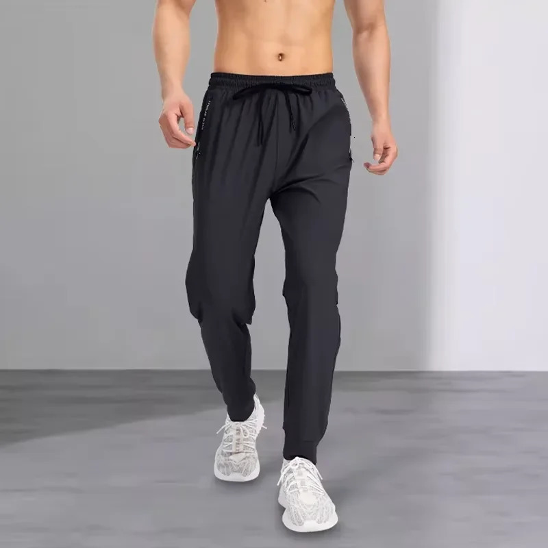 Ice silk pants mens quick drying elastic trend casual pants ultra-thin ice sports pants 260306