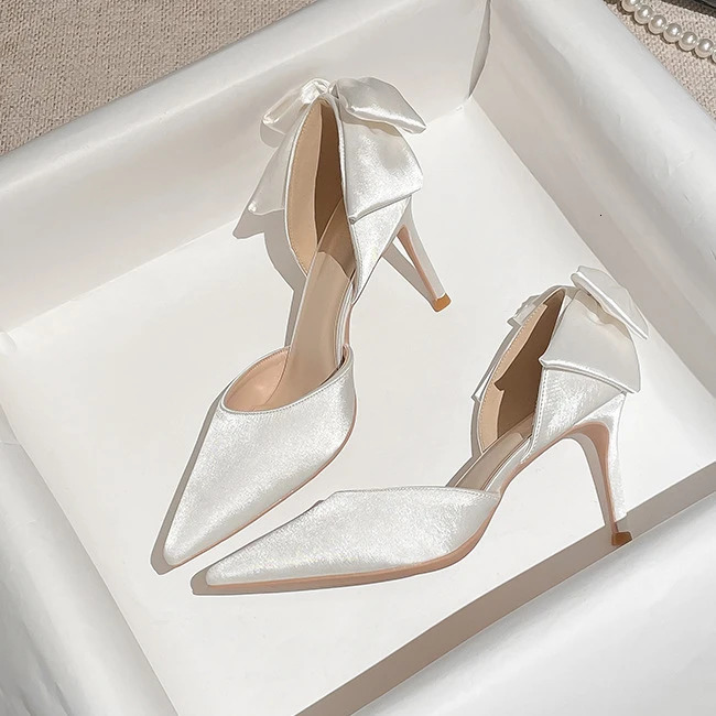 Solid Color Fashion Stiletto Bow Hollow Womens Wedding Shoes Womens Exquisite Shallow Mouth Satin High Heels 260306