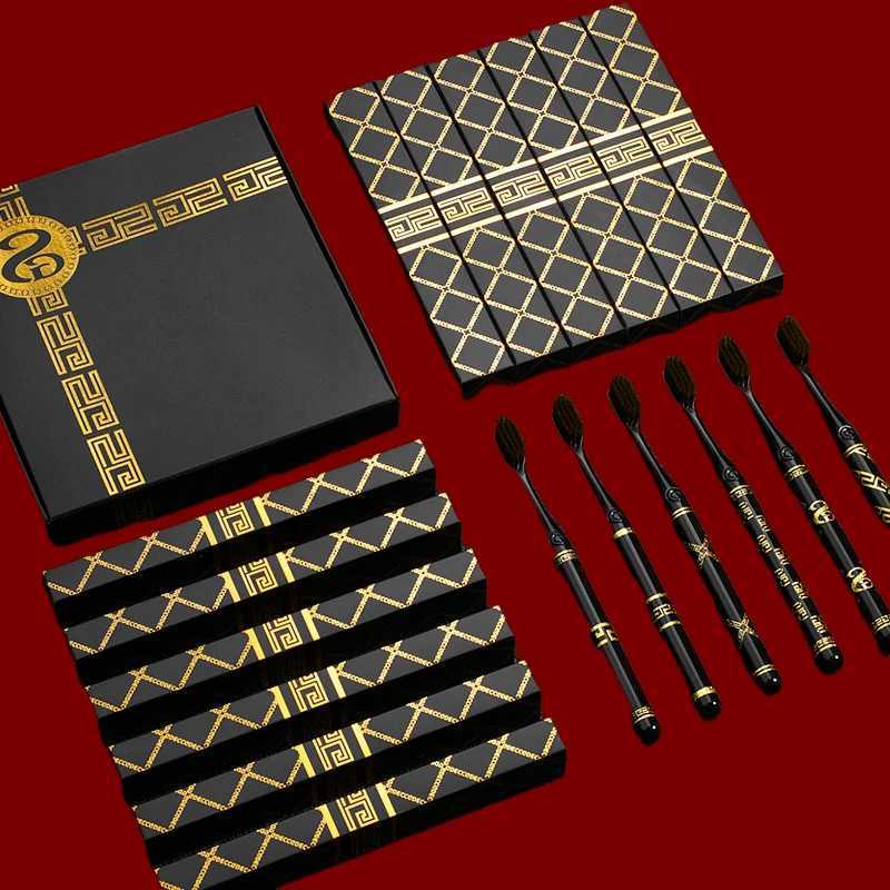 This high-end gift box toothbrush set features a black and gold light luxury design and a wide head, making it ideal for adult couples and family home