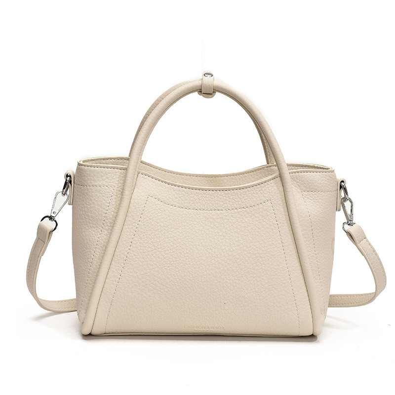 2026 Top Luxury Free Shipping New Large Capacity High End Commuter PU Shoulder Bag Niche Daily Commuter Soft Leather Luxury Bag Wing Bag Women's 