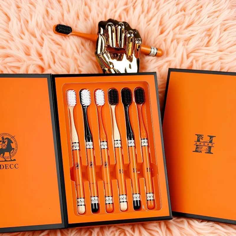 his 6-piece orange gift box toothbrush protects gums with soft bristles for adults and couples.T260307
