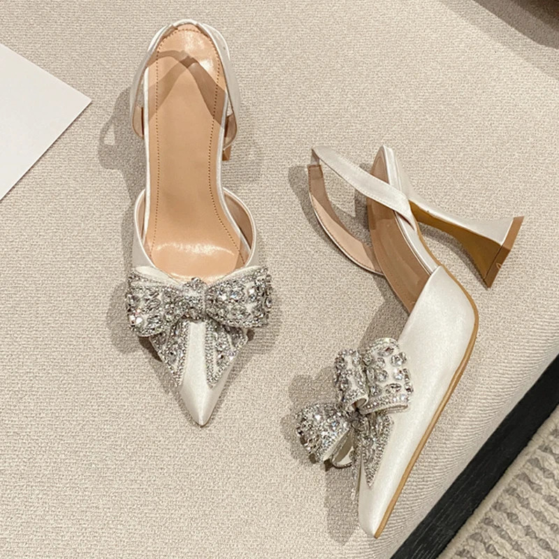Liyke Fashion Sequined Crystal Bowknot Women Pumps Sexy Pointed Toe Red High Heels Wedding Banquet Shoes Ladies Slingback Sandal 260306